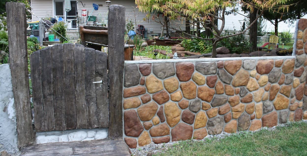 Multi color acid stain rock wall